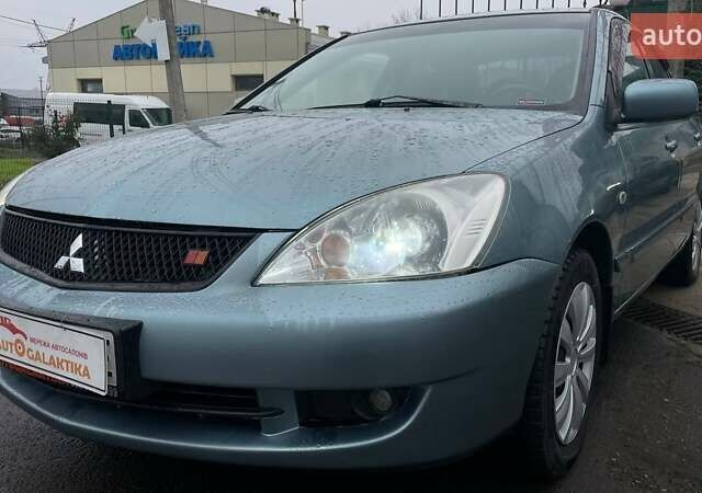 Зелений Міцубісі Lancer, об'ємом двигуна 1.6 л та пробігом 262 тис. км за 3999 $, фото 3 на Automoto.ua
