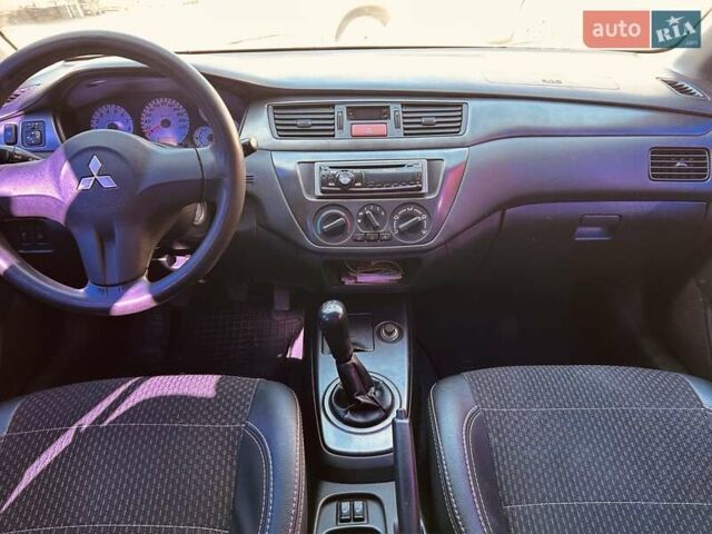 Зелений Міцубісі Lancer, об'ємом двигуна 1.6 л та пробігом 214 тис. км за 3800 $, фото 12 на Automoto.ua