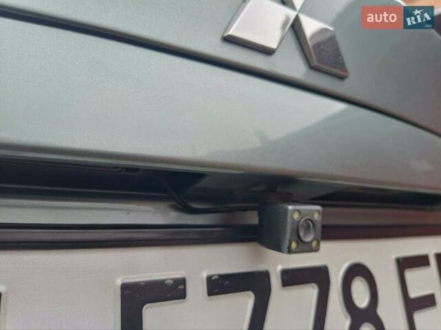 Зелений Міцубісі Lancer, об'ємом двигуна 1.6 л та пробігом 219 тис. км за 4700 $, фото 1 на Automoto.ua