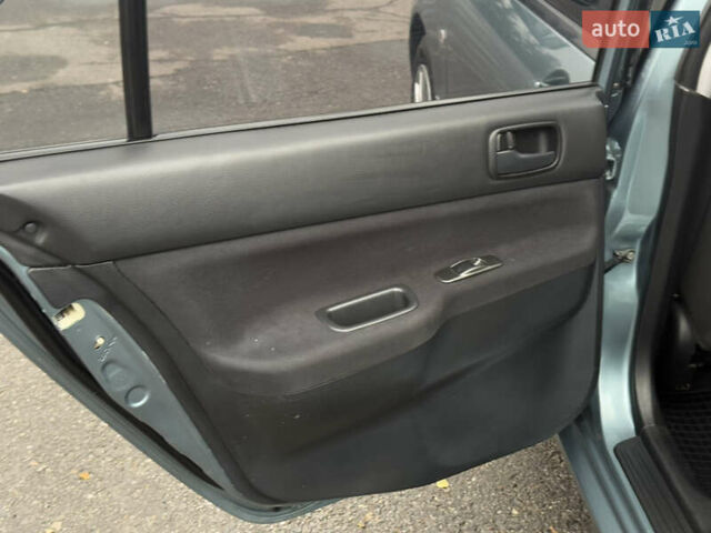 Зеленый Мицубиси Лансер, объемом двигателя 1.6 л и пробегом 214 тыс. км за 4150 $, фото 30 на Automoto.ua