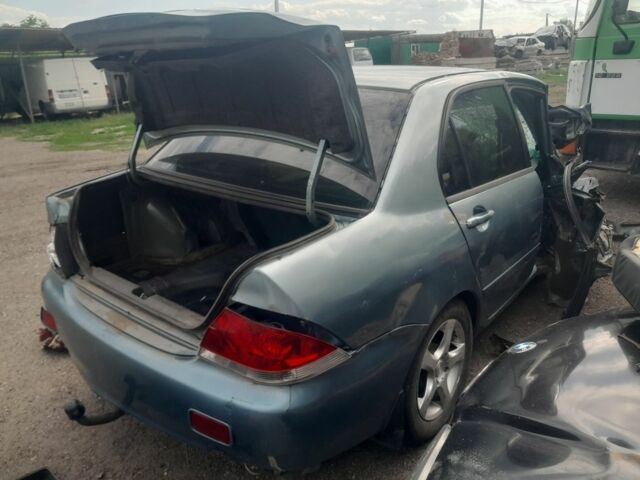 Зеленый Мицубиси Лансер, объемом двигателя 0 л и пробегом 200 тыс. км за 1200 $, фото 3 на Automoto.ua