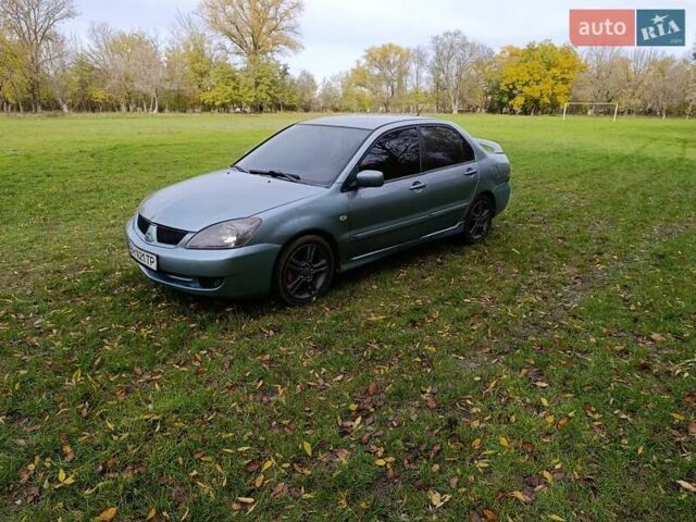 Міцубісі Lancer 2007 у Беляевке на Automoto.ua Зелений Міцубісі Lancer, об'ємом двигуна 2 л та пробігом 238 тис. км за 3400 $, фото 4 на Automoto.ua
