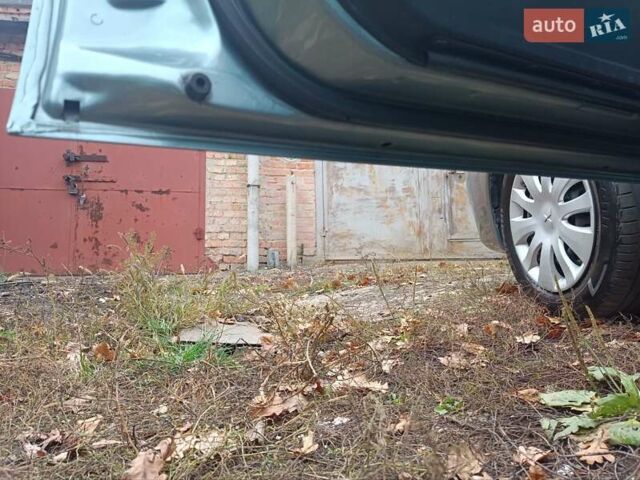 Зелений Міцубісі Lancer, об'ємом двигуна 1.6 л та пробігом 219 тис. км за 4700 $, фото 8 на Automoto.ua