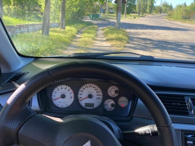 Зеленый Мицубиси Лансер, объемом двигателя 1.6 л и пробегом 220 тыс. км за 3700 $, фото 4 на Automoto.ua