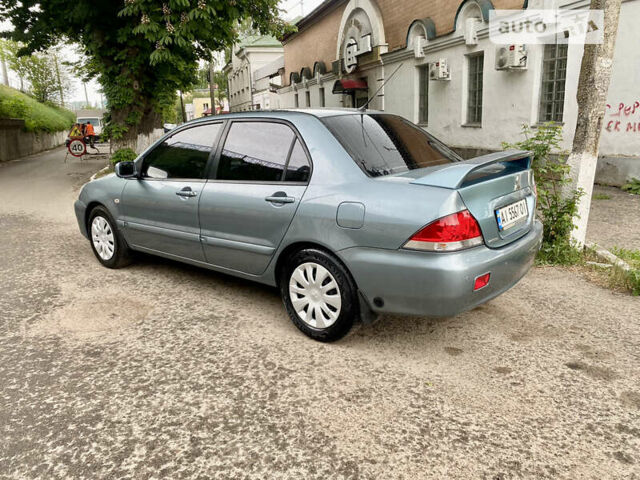 Зелений Міцубісі Lancer, об'ємом двигуна 1.6 л та пробігом 220 тис. км за 4750 $, фото 5 на Automoto.ua