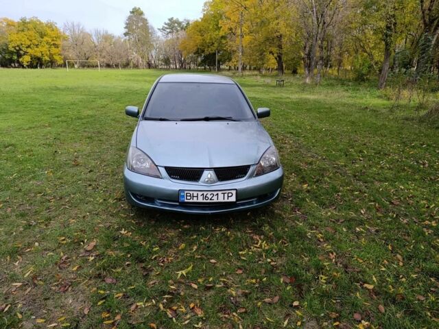 Зелений Міцубісі Lancer, об'ємом двигуна 2 л та пробігом 238 тис. км за 3400 $, фото 1 на Automoto.ua