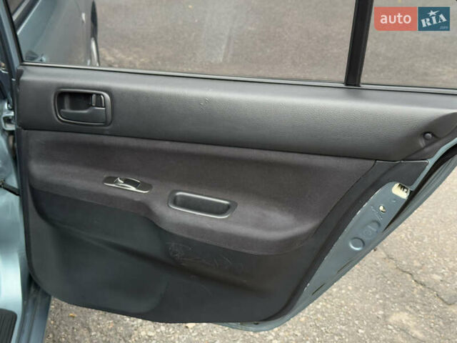 Зеленый Мицубиси Лансер, объемом двигателя 1.6 л и пробегом 214 тыс. км за 4150 $, фото 31 на Automoto.ua