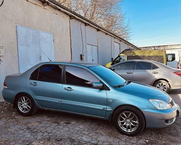 Зелений Міцубісі Lancer, об'ємом двигуна 1.6 л та пробігом 214 тис. км за 3800 $, фото 3 на Automoto.ua