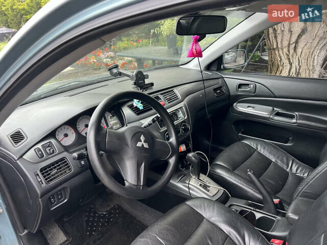 Зелений Міцубісі Lancer, об'ємом двигуна 1.6 л та пробігом 217 тис. км за 5400 $, фото 6 на Automoto.ua