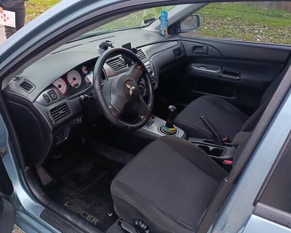 Зелений Міцубісі Lancer, об'ємом двигуна 1.6 л та пробігом 162 тис. км за 4700 $, фото 9 на Automoto.ua
