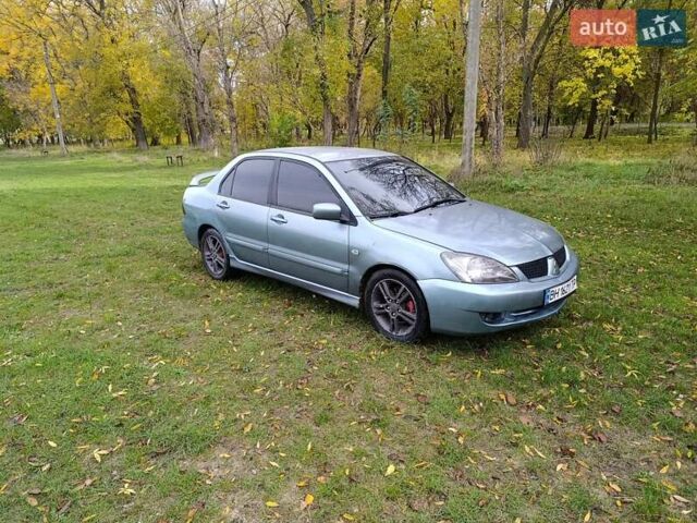 Міцубісі Lancer 2007 у Беляевке на Automoto.ua Зелений Міцубісі Lancer, об'ємом двигуна 2 л та пробігом 238 тис. км за 3400 $, фото 2 на Automoto.ua
