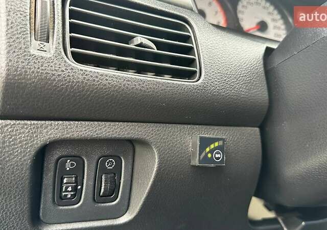 Зелений Міцубісі Lancer, об'ємом двигуна 1.58 л та пробігом 207 тис. км за 3400 $, фото 10 на Automoto.ua