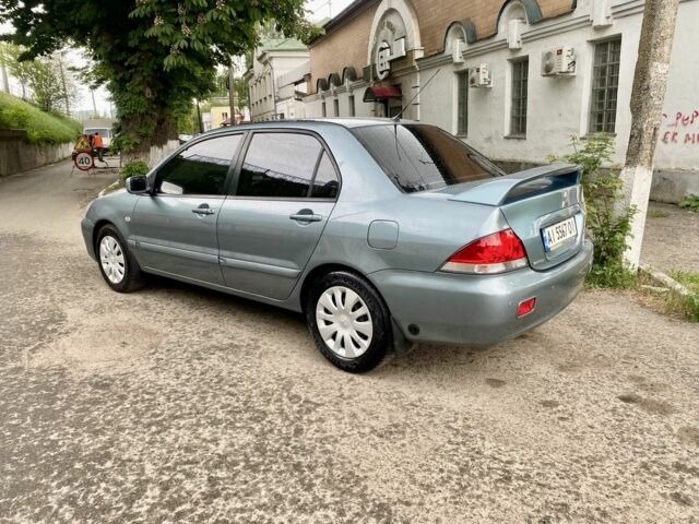 Зелений Міцубісі Lancer, об'ємом двигуна 1.6 л та пробігом 200 тис. км за 4750 $, фото 5 на Automoto.ua