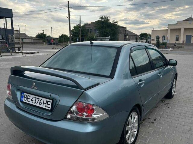 Зеленый Мицубиси Лансер, объемом двигателя 1.6 л и пробегом 300 тыс. км за 3800 $, фото 7 на Automoto.ua