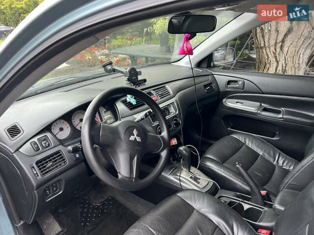Зелений Міцубісі Lancer, об'ємом двигуна 1.6 л та пробігом 217 тис. км за 5400 $, фото 5 на Automoto.ua