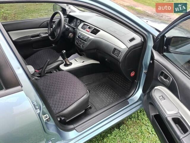 Зеленый Мицубиси Лансер, объемом двигателя 1.58 л и пробегом 300 тыс. км за 3999 $, фото 6 на Automoto.ua