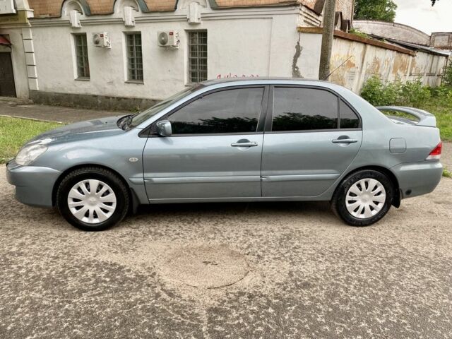 Зелений Міцубісі Lancer, об'ємом двигуна 1.6 л та пробігом 200 тис. км за 4750 $, фото 3 на Automoto.ua