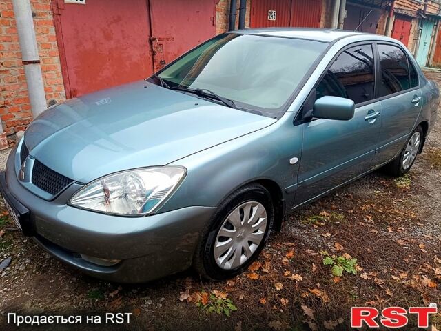 Зелений Міцубісі Lancer, об'ємом двигуна 1.6 л та пробігом 219 тис. км за 4900 $, фото 2 на Automoto.ua