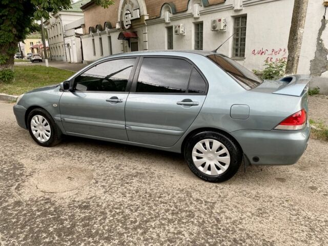 Зелений Міцубісі Lancer, об'ємом двигуна 1.6 л та пробігом 200 тис. км за 4750 $, фото 4 на Automoto.ua