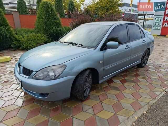 Міцубісі Lancer 2007 у Беляевке на Automoto.ua Зелений Міцубісі Lancer, об'ємом двигуна 2 л та пробігом 238 тис. км за 3400 $, фото 6 на Automoto.ua