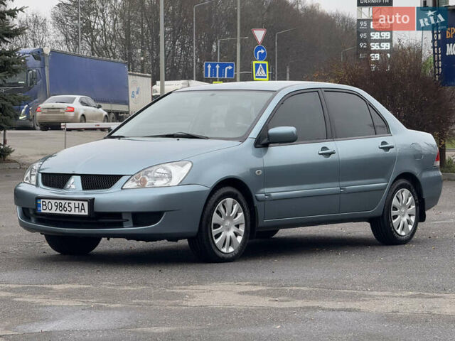 Зеленый Мицубиси Лансер, объемом двигателя 1.6 л и пробегом 214 тыс. км за 4150 $, фото 2 на Automoto.ua