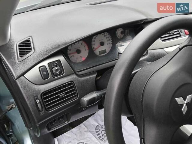 Зеленый Мицубиси Лансер, объемом двигателя 1.58 л и пробегом 300 тыс. км за 3999 $, фото 7 на Automoto.ua