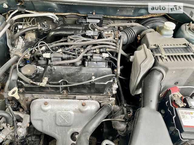 Зелений Міцубісі Lancer, об'ємом двигуна 1.6 л та пробігом 220 тис. км за 4750 $, фото 44 на Automoto.ua