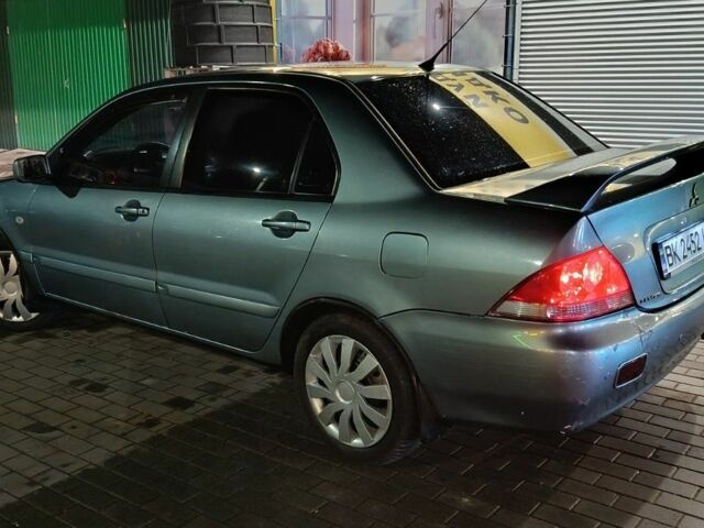 Зелений Міцубісі Lancer, об'ємом двигуна 1.6 л та пробігом 203 тис. км за 3700 $, фото 2 на Automoto.ua