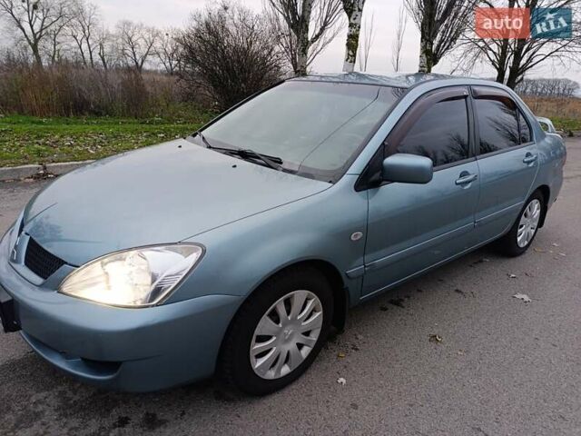 Зелений Міцубісі Lancer, об'ємом двигуна 1.6 л та пробігом 162 тис. км за 4700 $, фото 7 на Automoto.ua