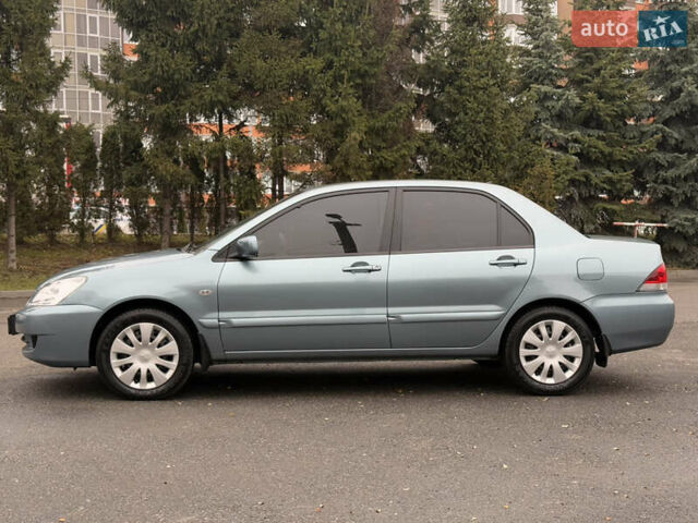 Зеленый Мицубиси Лансер, объемом двигателя 1.6 л и пробегом 214 тыс. км за 4150 $, фото 3 на Automoto.ua