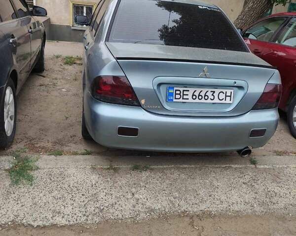 Зеленый Мицубиси Лансер, объемом двигателя 1.6 л и пробегом 270 тыс. км за 4350 $, фото 4 на Automoto.ua
