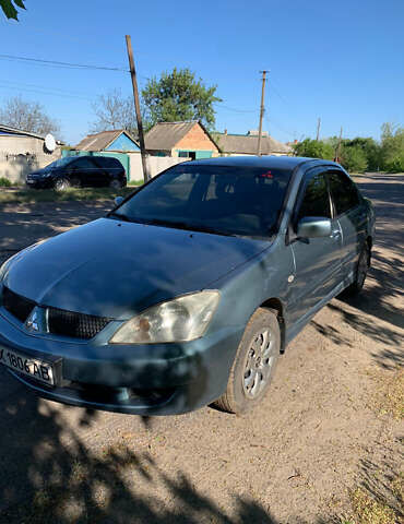 Зелений Міцубісі Lancer, об'ємом двигуна 1.6 л та пробігом 220 тис. км за 3700 $, фото 2 на Automoto.ua