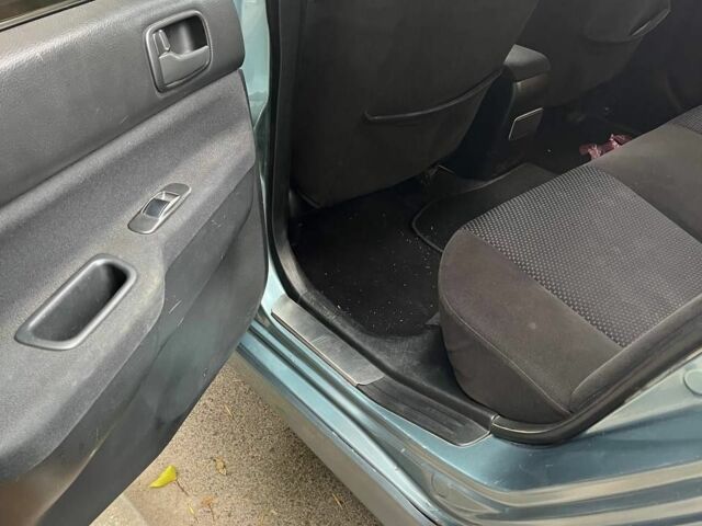 Зеленый Мицубиси Лансер, объемом двигателя 1.6 л и пробегом 255 тыс. км за 4000 $, фото 3 на Automoto.ua