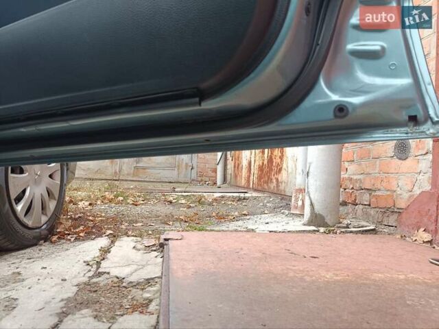 Зеленый Мицубиси Лансер, объемом двигателя 1.6 л и пробегом 219 тыс. км за 5300 $, фото 10 на Automoto.ua