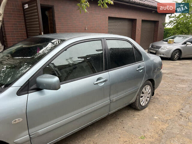 Зелений Міцубісі Lancer, об'ємом двигуна 1.6 л та пробігом 217 тис. км за 5400 $, фото 4 на Automoto.ua