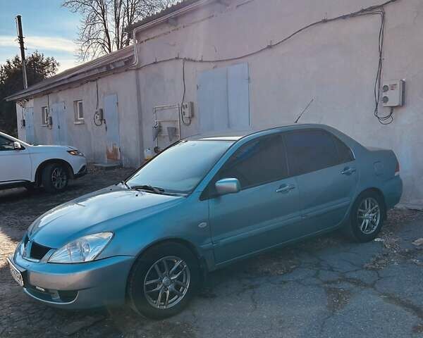 Зелений Міцубісі Lancer, об'ємом двигуна 1.6 л та пробігом 214 тис. км за 3800 $, фото 2 на Automoto.ua