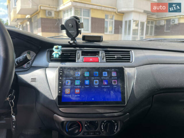 Зелений Міцубісі Lancer, об'ємом двигуна 1.6 л та пробігом 217 тис. км за 5400 $, фото 2 на Automoto.ua