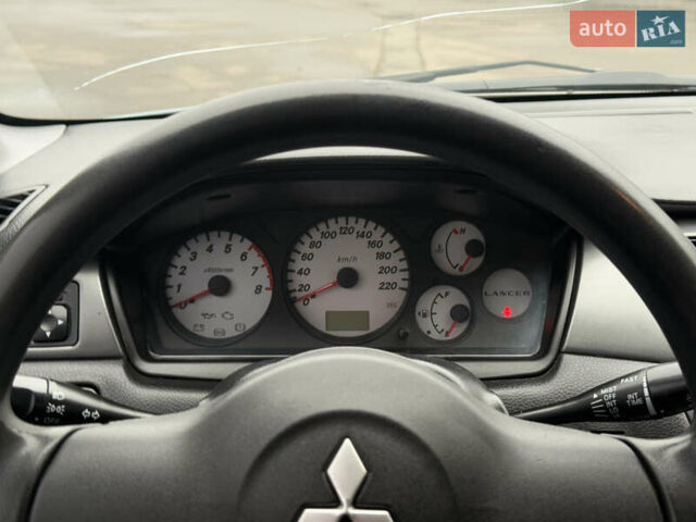 Зеленый Мицубиси Лансер, объемом двигателя 1.6 л и пробегом 214 тыс. км за 4150 $, фото 17 на Automoto.ua
