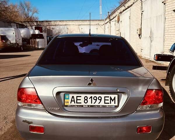 Зелений Міцубісі Lancer, об'ємом двигуна 1.6 л та пробігом 214 тис. км за 3800 $, фото 1 на Automoto.ua
