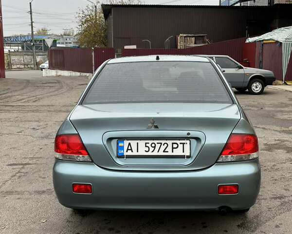 Мицубиси Лансер 2007 в Чернигове на Automoto.ua Зеленый Мицубиси Лансер, объемом двигателя 1.6 л и пробегом 247 тыс. км за 4200 $, фото 2 на Automoto.ua