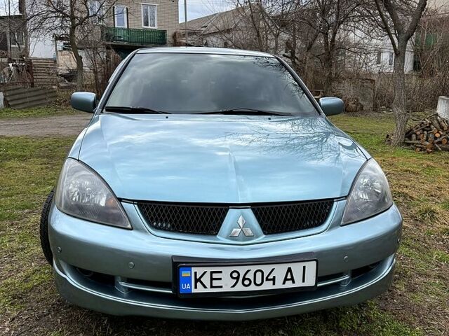 Зелений Міцубісі Lancer, об'ємом двигуна 2 л та пробігом 225 тис. км за 5600 $, фото 1 на Automoto.ua
