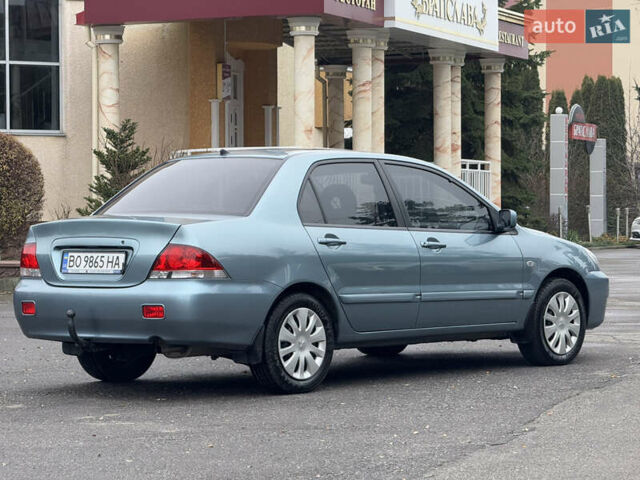 Зеленый Мицубиси Лансер, объемом двигателя 1.6 л и пробегом 214 тыс. км за 4150 $, фото 6 на Automoto.ua