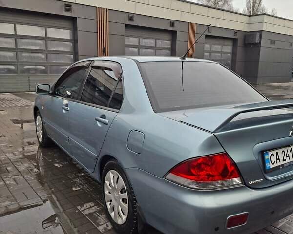 Зеленый Мицубиси Лансер, объемом двигателя 1.6 л и пробегом 165 тыс. км за 5500 $, фото 7 на Automoto.ua