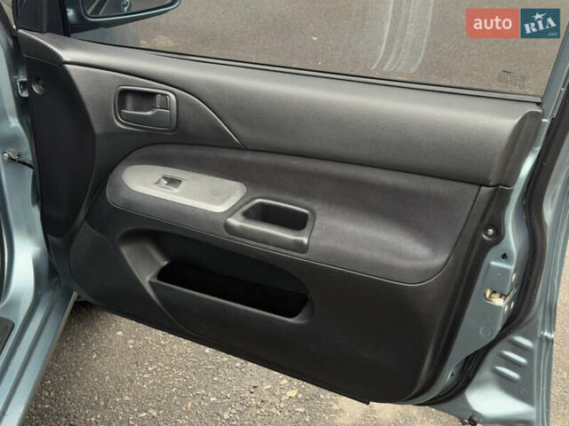 Зеленый Мицубиси Лансер, объемом двигателя 1.6 л и пробегом 214 тыс. км за 4150 $, фото 29 на Automoto.ua