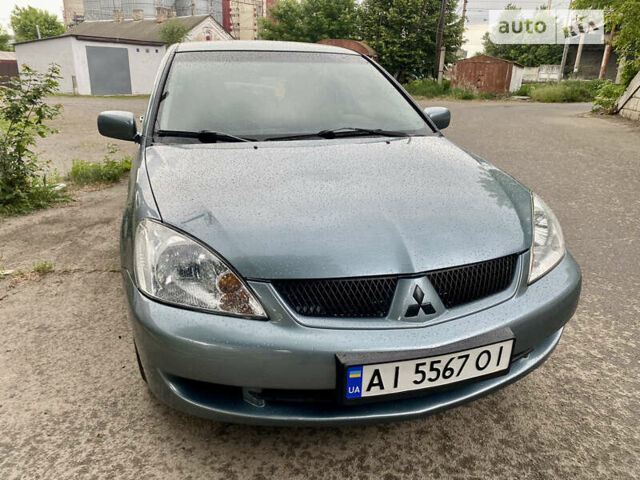 Зелений Міцубісі Lancer, об'ємом двигуна 1.6 л та пробігом 220 тис. км за 4750 $, фото 12 на Automoto.ua