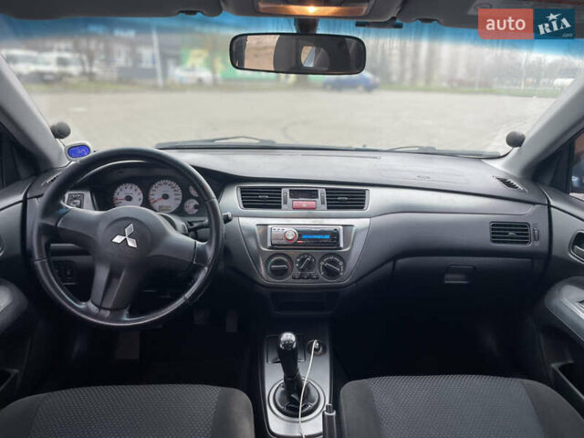 Зеленый Мицубиси Лансер, объемом двигателя 1.6 л и пробегом 164 тыс. км за 5000 $, фото 8 на Automoto.ua