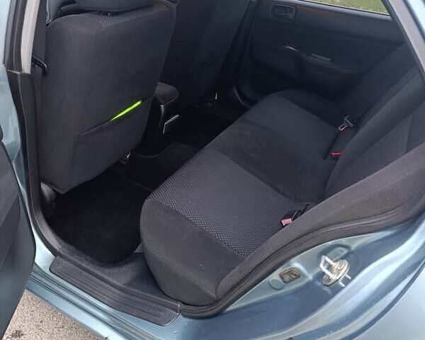 Зелений Міцубісі Lancer, об'ємом двигуна 1.6 л та пробігом 162 тис. км за 4700 $, фото 11 на Automoto.ua