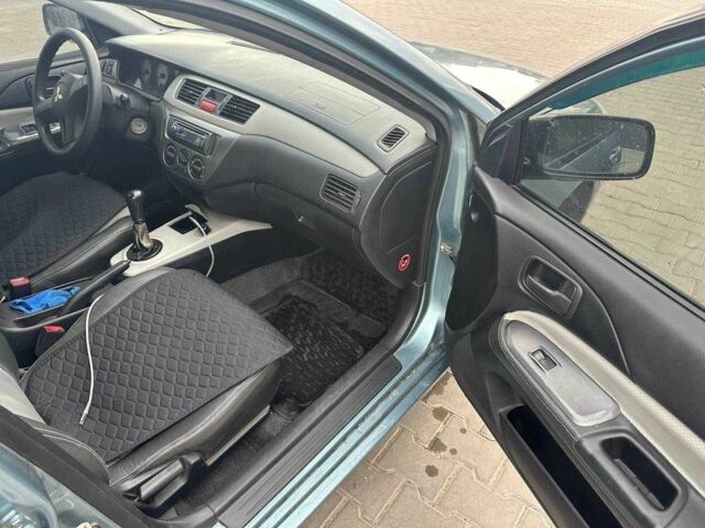 Зеленый Мицубиси Лансер, объемом двигателя 1.6 л и пробегом 300 тыс. км за 3800 $, фото 13 на Automoto.ua