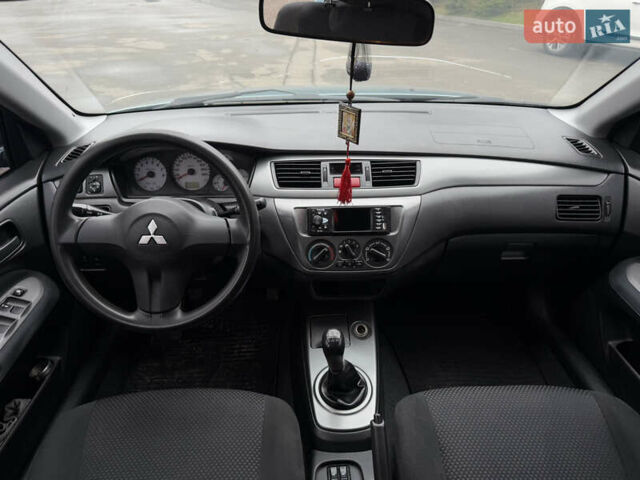 Зеленый Мицубиси Лансер, объемом двигателя 1.6 л и пробегом 214 тыс. км за 4150 $, фото 16 на Automoto.ua