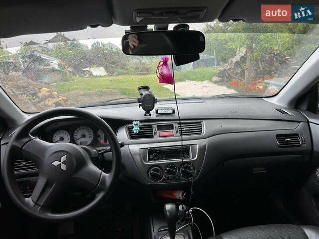 Зелений Міцубісі Lancer, об'ємом двигуна 1.6 л та пробігом 217 тис. км за 5400 $, фото 8 на Automoto.ua